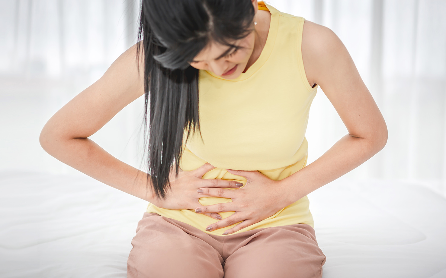 Правилното справяне с болки в стомаха при бременни млади